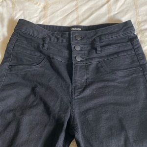 Black high waisted jeans.